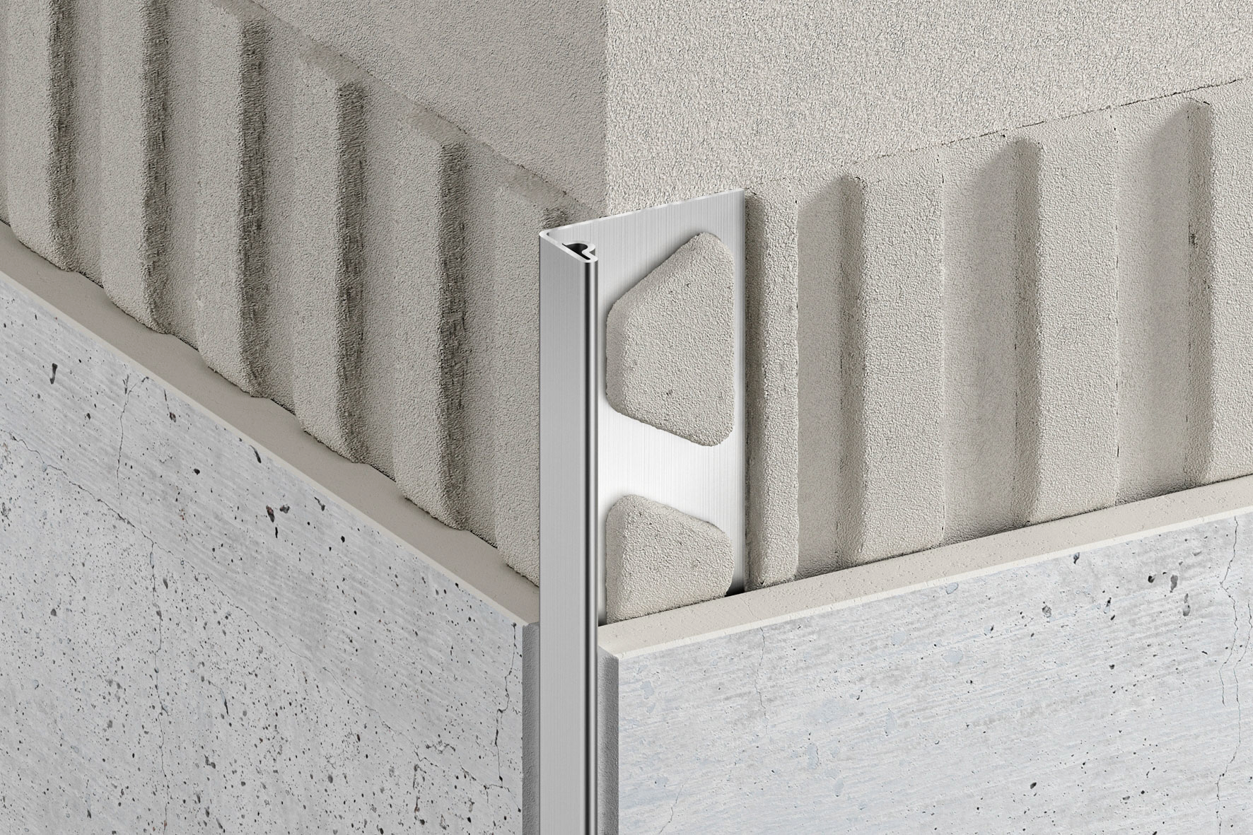 Querschnitt einer Kante einer gefliesten Wand mit Abschlussschiene